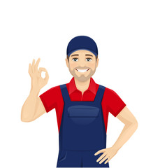 Handsame man in blue overalls gesturing ok sign isolated vector illustration