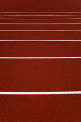 Red stadium running tracks closeup