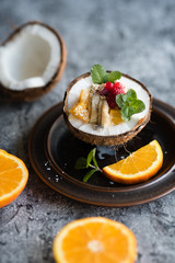 Smoothie bowl with colorful tropical fruits. Summer healthy diet, vegan breakfast.