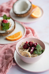 Smoothie bowl with colorful tropical fruits. Summer healthy diet, vegan breakfast.