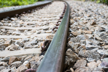 Fototapeta na wymiar Iron Railway tracks railroad for Trains, Forward line view and tree background