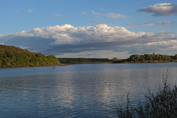 Beautiful clouds over a large river