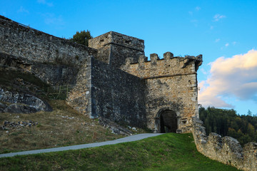 Fototapeta na wymiar Fragment of an old stone defensive fortress.