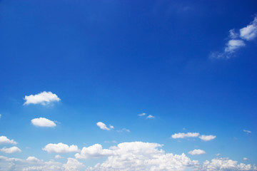 Naklejka na ściany i meble Blue sky background and white clouds soft focus, and copy space