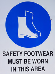 Caution: Safety footwear must be worn in this area sign.