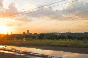 electrical wires on the background of the sunset sky