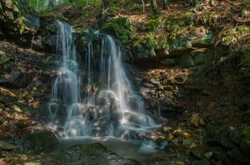 Fototapeta na wymiar Waterfall in Tosanovsky stream, Beskydy mountains, Czech Republic