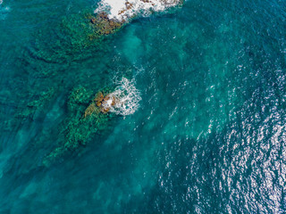 Marvelous shore. Large boulder among the waves in the sea. Hawaii