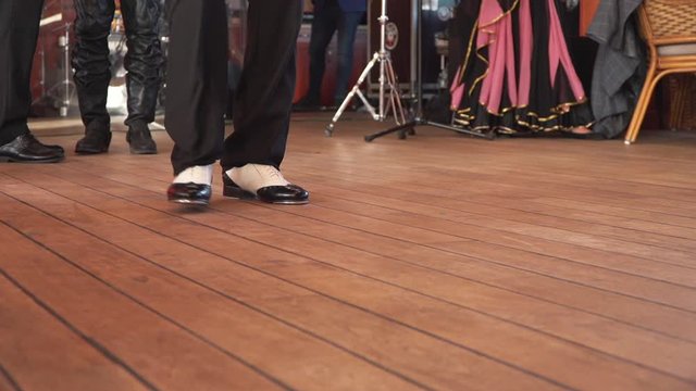 Tap dancer feet at a banquet