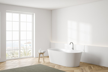 Naklejka na ściany i meble White bathroom corner with tub