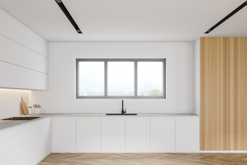 White and wooden kitchen with cupboards