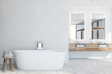 Naklejka na ściany i meble White bathroom interior with tub and sink