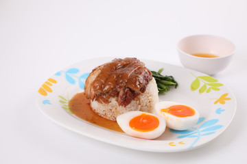 stewed pork leg with rice local Thai food street food isolated in white background