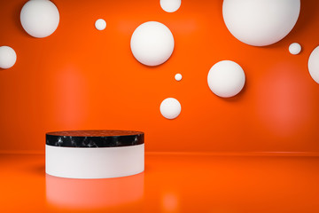 White and black marble platform in orange room