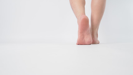 Asian Male barefoot is isolated on white background.