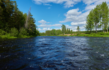 Naamijoki river in Western Lapland in Pello, Finland nearby where the river is joining Tornionjoki to which it is a tributary river.