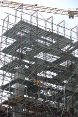 JOHOR, MALAYSIA -APRIL 13, 2016: Scaffolding used as the temporary structure to support platform, form work and structure at the construction site. Also used it as a walking platform for workers. 
