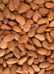 Almond stacks for a background concept,Vertical.