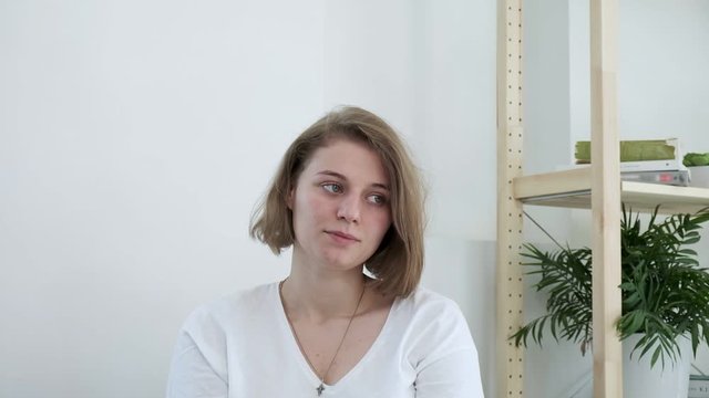 Mindblown reaction of upset millennial girl expressing shock. young caucasian woman in shocking situation, gesture of mind blown. She never expected this, she is surprised, dissatisfied, disappointed