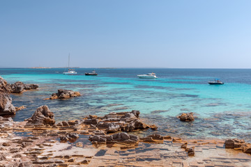 Beautiful view to the emerald clear sea of the Ibiza island. Balearic Islands, Spain