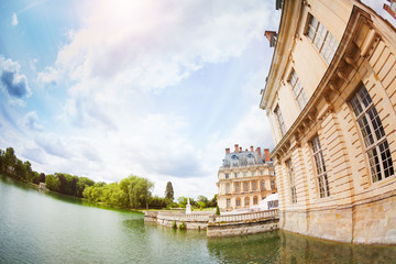 French king royal Fontainebleau palace and pond, France