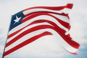 Waving flags of the world - flag of Liberia. Shot with a shallow depth of field, selective focus. 3D illustration.