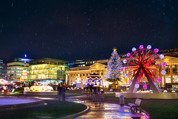 Column and Christmas decorations on Schlossplatz square, Stuttgart before New year, Germany
