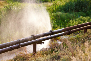 Leakage of water from an industrial water pipe.