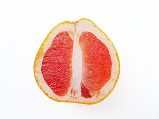 Red ripe juicy grapefruit in a cut on a white background. The concept of diet and healthy eating. A...