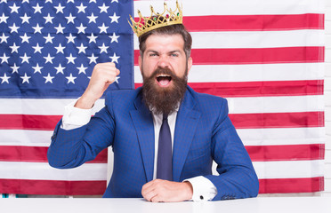 Reputable businessman handsome man sit desk american flag background, fame and glory concept