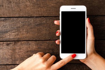 Woman using smartphone. Top view