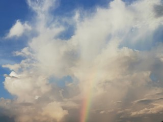 Fototapeta na wymiar Rainbow in the blue sky