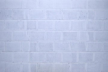 Beton wall. Brick wall. White and gray texture. 
Background.