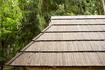 Old authentic wooden house with logs