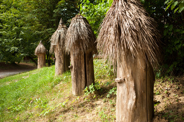 Authentic beehive made of logs. The old apiary