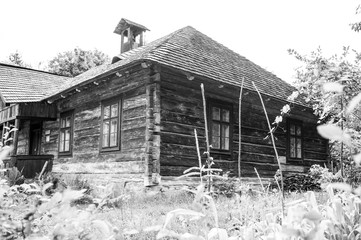 Old authentic wooden house with logs