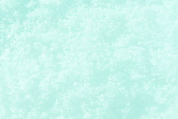 Abstract Christmas background with white shimmer lights and snowflakes. Textures blue ice. Ice rink. Winter background. Glowing blizzard. Xmas, Happy New Year, Noel, Yule Winter Season Holidays. EPS