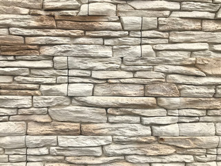 A wall of stone. Natural background and wall of the building.  