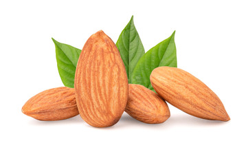 Closeup isolated of fresh almonds nut seed with green leaves on white background.
