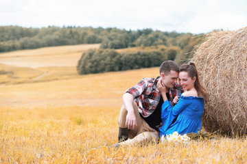Couple on a walk in the country fields