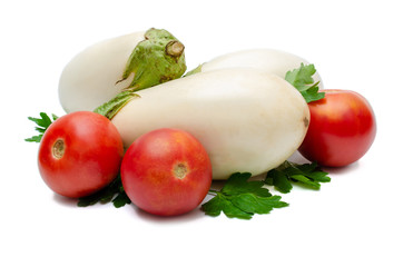 White eggplants with tomatoes on white isolated background