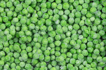 Frozen green peas texture background. ice peas background for food textures. Raw vegetables.