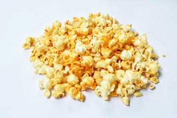 salty baked cheese popcorn arranging on white background