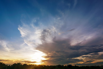 Sunrise sky over agricultural field.