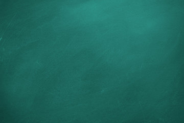 Abstract texture of chalk rubbed out on blackboard or chalkboard background. School education, dark wall backdrop or learning concept.