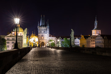 Obraz premium Old Prague, Czech Republic, Bohemia, Castles and Charles Bridge at night without people.