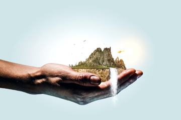 Mountain with snow top in hands