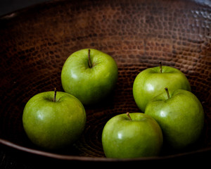 Green apples in a bowl