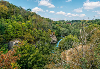 Obraz premium Autumn nature. Mountain Tikich river and canyon