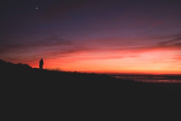 Fototapeta na wymiar Silhouette of person at sunset